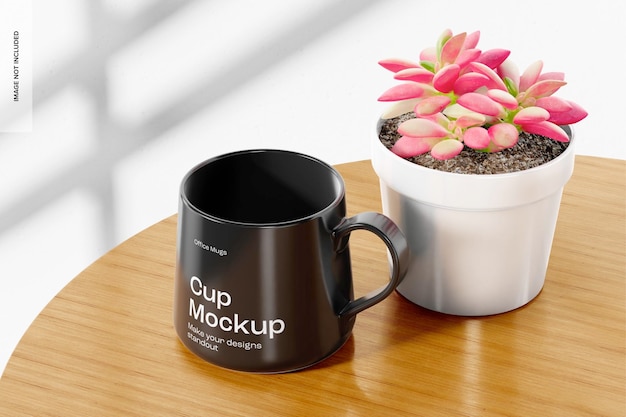 PSD cup on wooden desk mockup high angle view