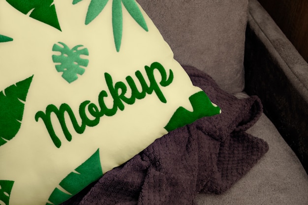 Cushion mock-up design with leaves pattern