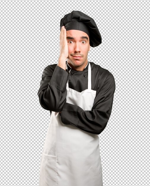 PSD depressed young chef posing