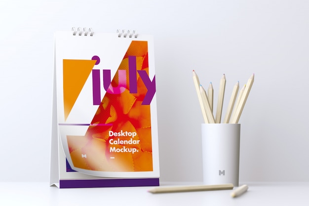 Desktop Portrait Calendar Mockup With Cup of Pencils