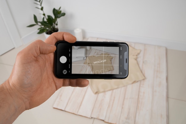 Device taking picture of clotheing mockup