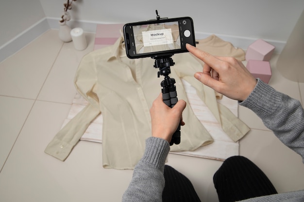 Device taking picture of clotheing mockup