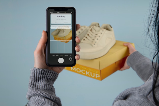 Device taking picture of shoes mockup