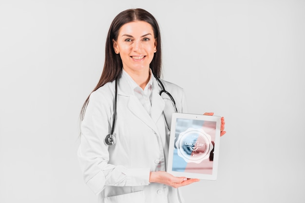 Doctor holding tablet mockup for labor day