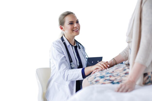 PSD doctor and patient discussing something while sitting at the table medicine and health care concept