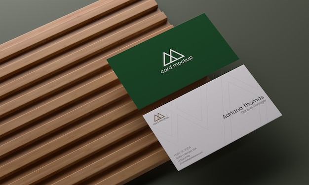 Double sided business card mockup with elegant wood panel background