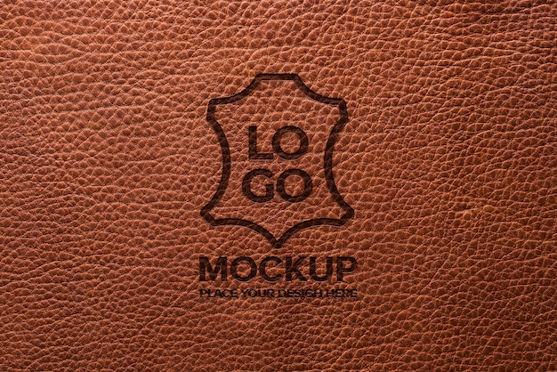 Dramatic warm light over leather logo mockup