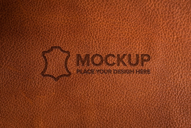 Dramatic warm light over leather logo mockup