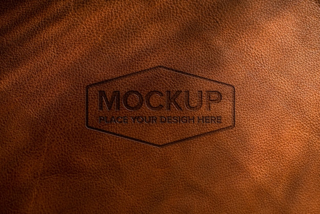 Dramatic warm light over leather logo mockup