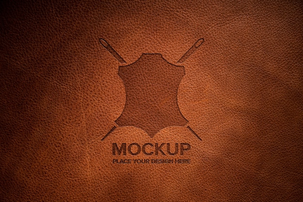 Dramatic warm light over leather logo mockup