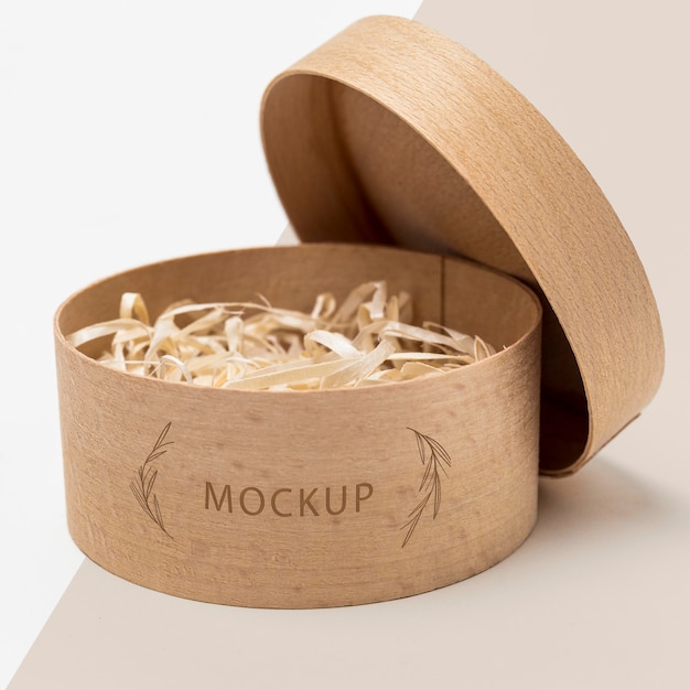 Eco-friendly packaging with shredded paper inside mock-up