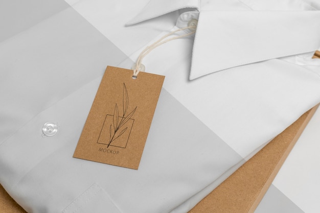 Eco-friendly price tag and paper bag with formal shirt mock-up