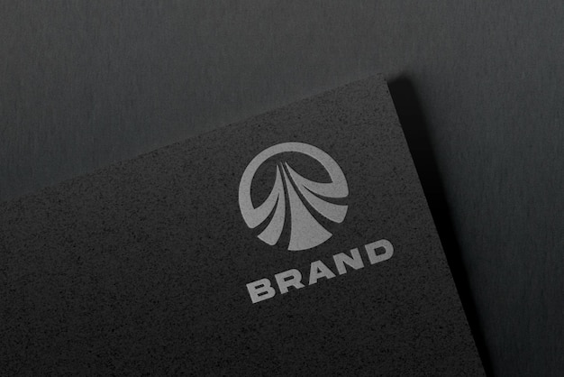 Elegant logo mockup on black paper