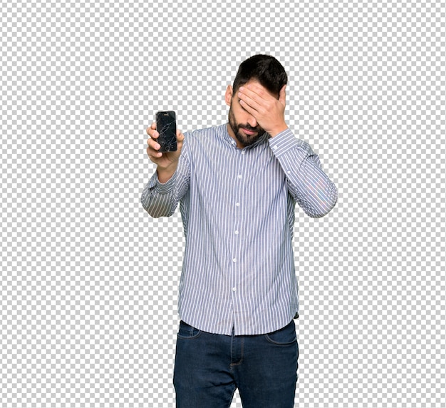 Elegant man with shirt with troubled holding broken smartphone