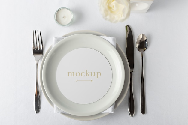 Elegant tableware composition with round mock-up card