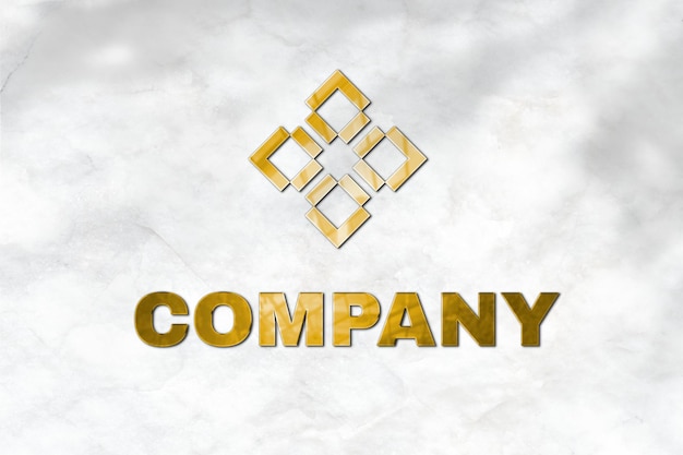 Emboss logo mockup psd in gold for company with tag line here text