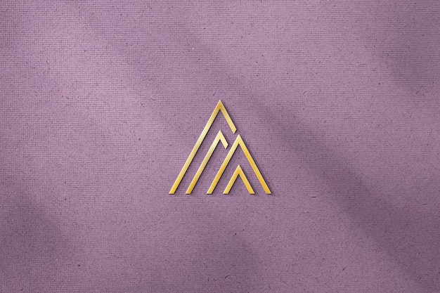 Embossed Gold Logo Mockup on Purple Colored Background