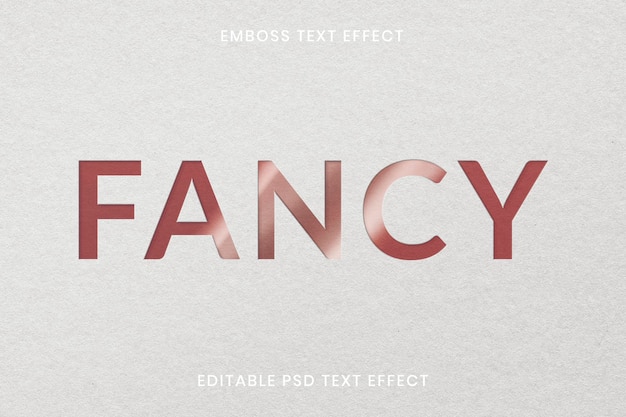 PSD embossed text effect psd editable template on white paper texture background