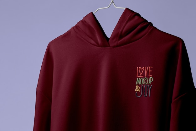 PSD embroidered logo on burgundy hoodie