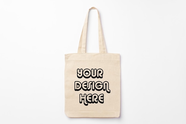 Empty fabric shopping bag on white background