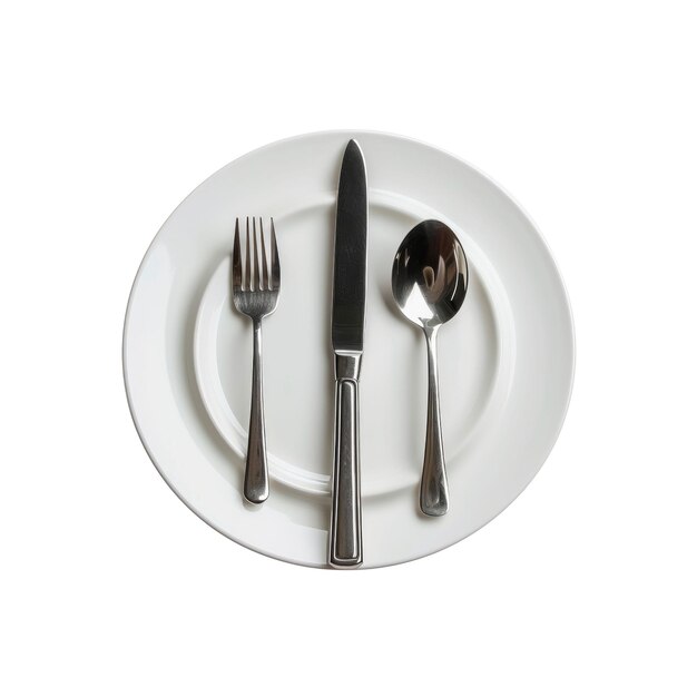 PSD an empty plate with a knife spoon and fork isolated on white