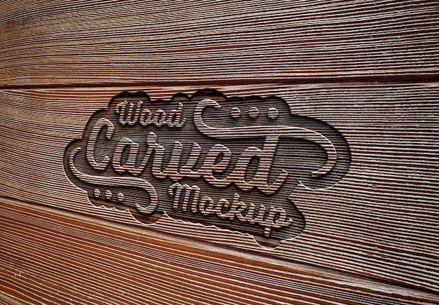 Engraved text effect on wood plank texture Mockup