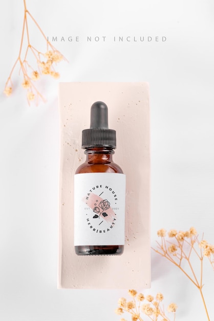 PSD essence in glass mockup bottle on white stand background isolated skincare oil