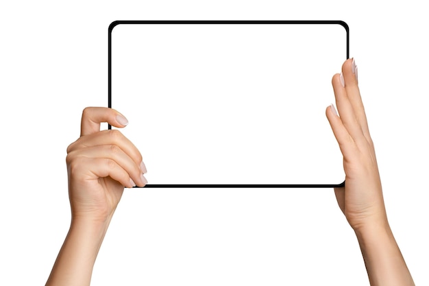 Female hands holding tablet with blank screen on empty background