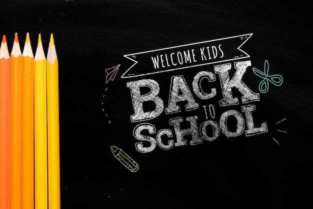 Flat lay back to school message on blackboard mock-up