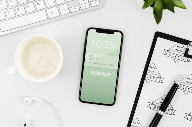 Flat lay clipboard and smartphone mock-up