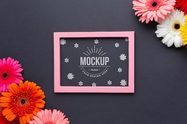 Flat lay of daisies with frame mock-up