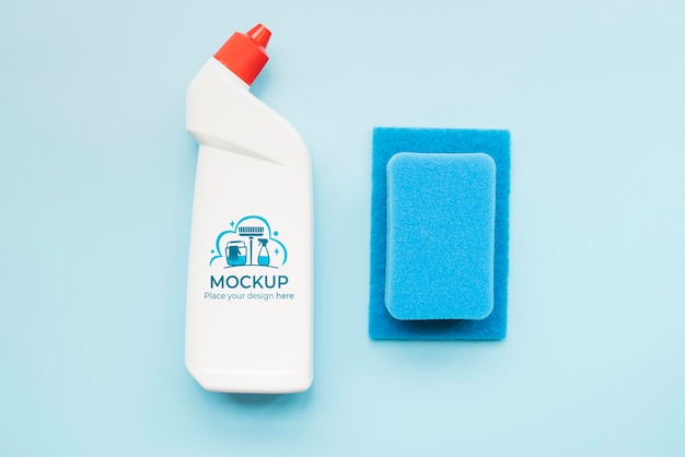 Flat lay detergent bottle and sponge