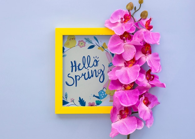 Flat lay frame mockup with spring flowers