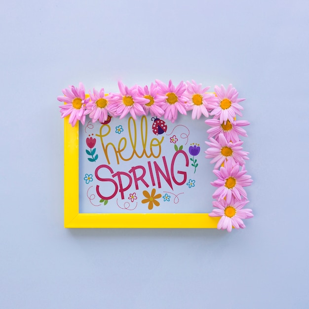 Flat lay frame mockup with spring flowers