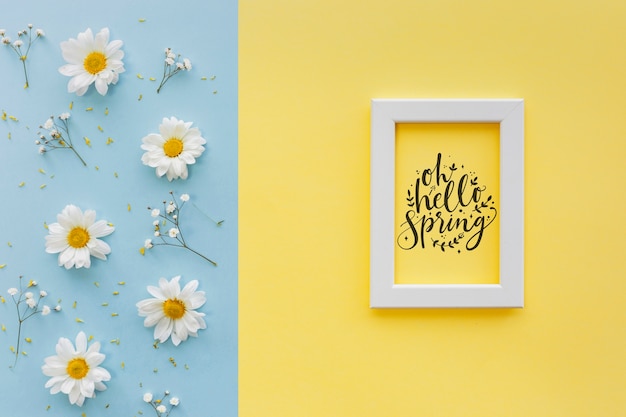 Flat lay frame mockup with spring flowers