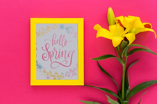 Flat lay frame mockup with spring flowers