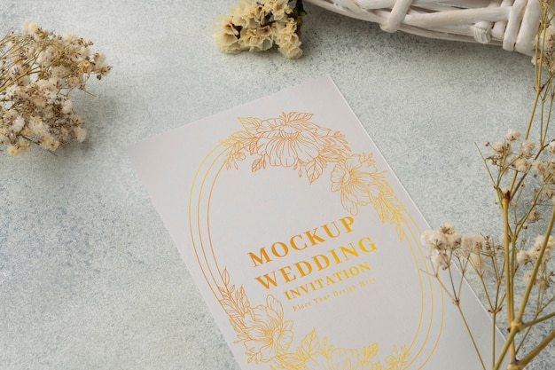 Flat lay golden wedding invitation