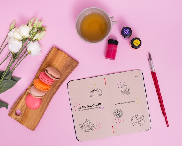 Flat lay macarons and tea arrangement