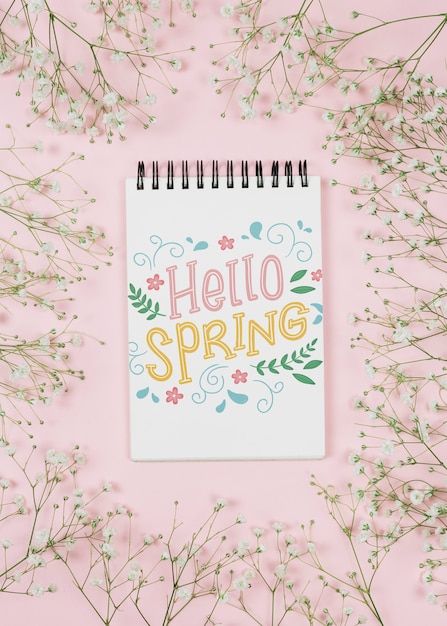 Flat lay notepad mockup with spring concept