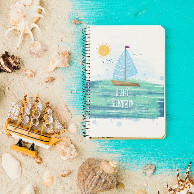 Flat lay notepad mockup with summer elements