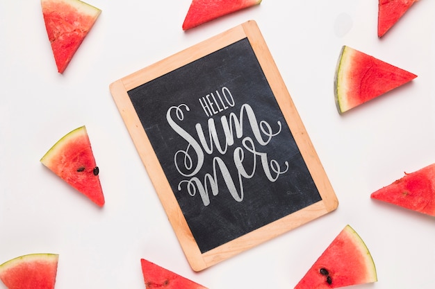 Flat lay slate mockup with watermelons