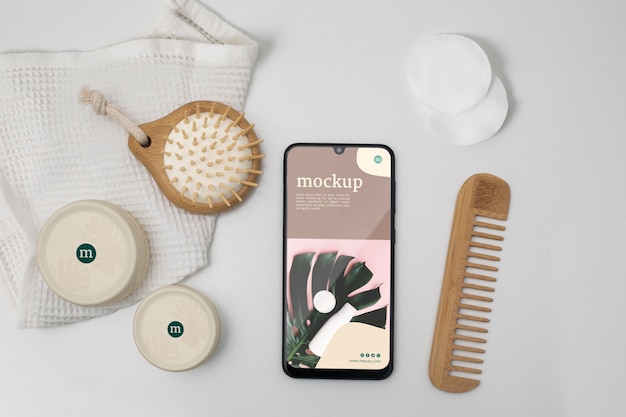 Flat lay of smartphone mockup with cosmetic products