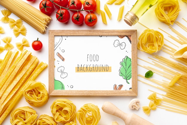 Flat lay uncooked pasta assortment and tomatoes with frame mock-up