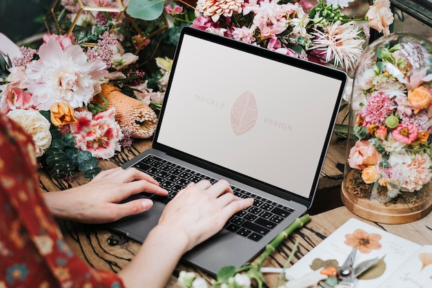 Florist using a laptop screen mockup