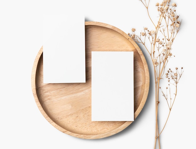 Flyer psd mockup on wooden plate in flat lay style