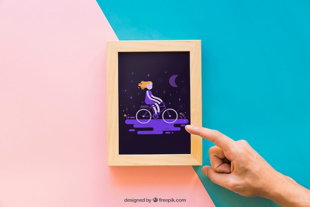 Frame mockup with pointing finger