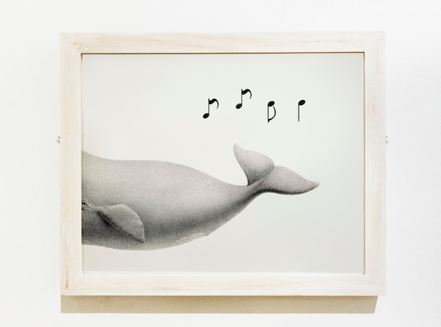 PSD framed art piece of a whale singing