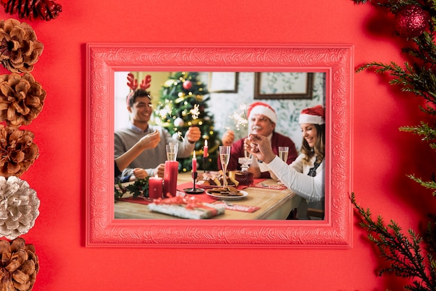 Framed family photo with pine cones