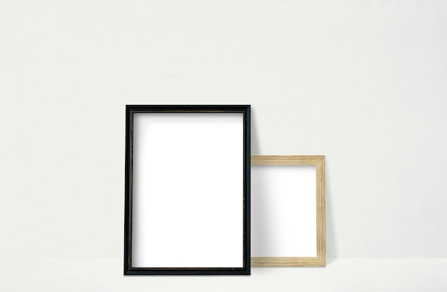 Frames leaning against a wall