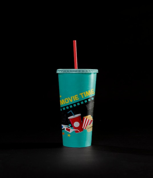 Front view of cinema cup with straw